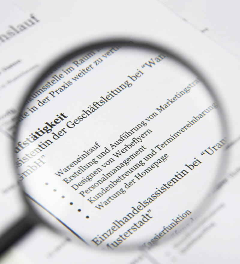 Magnifying glass over document research